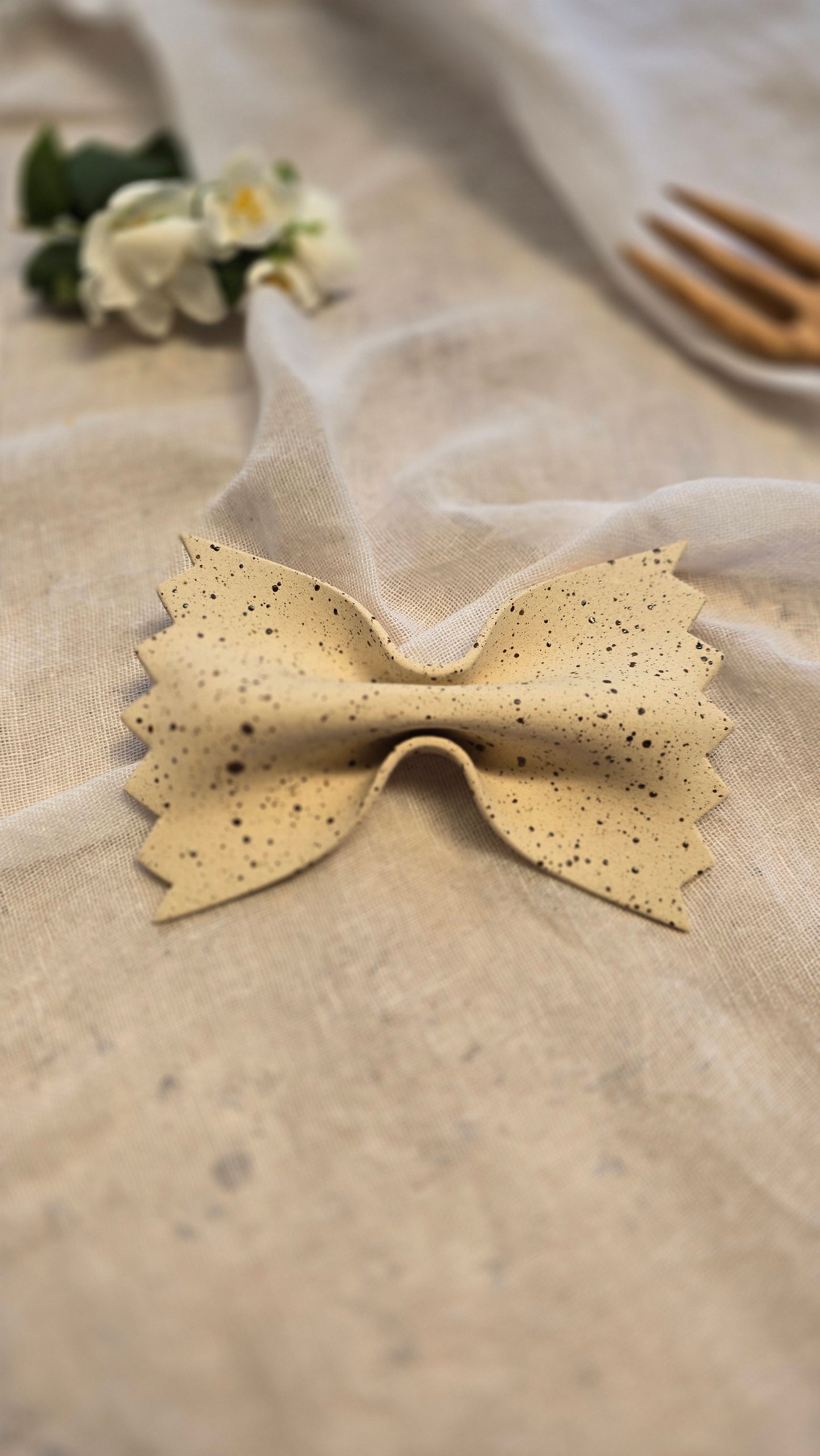 farfalle en grès mouchetée