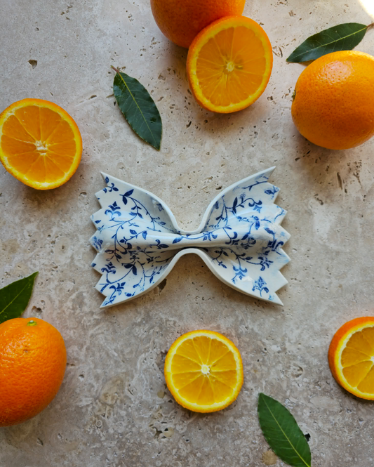 farfalle céramique blanc imprimé feuilles bleu
